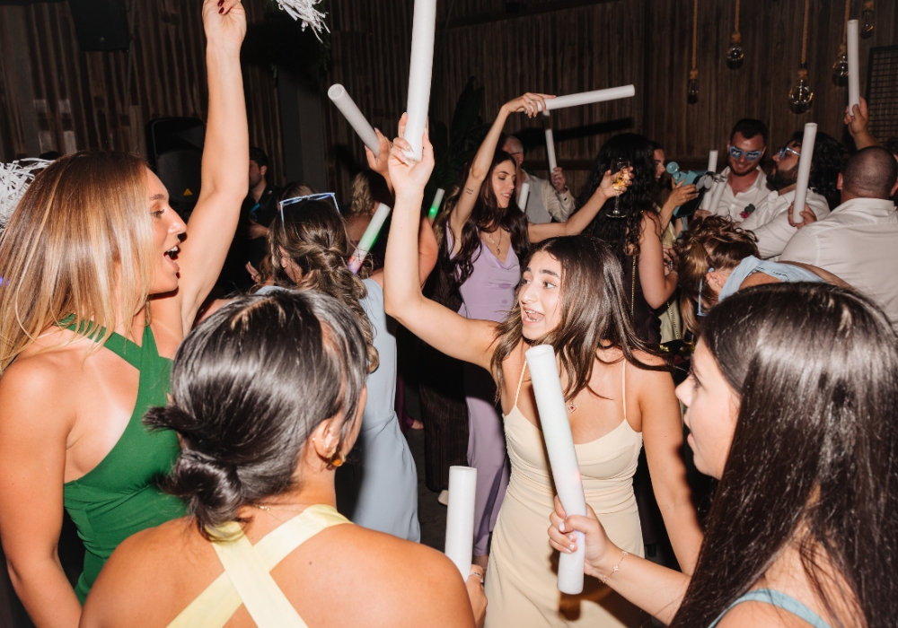 Group dancing at a wedding.
